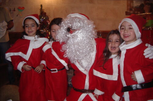 Primos de pequeños con Papá Noel